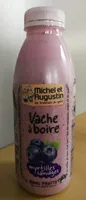 Vache à boire myrtilles sauvages