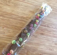 guimauve enrobée de chocolat au lait avec bonbons