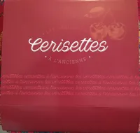 Cerise à queue et à noyau dans une crème liqueur