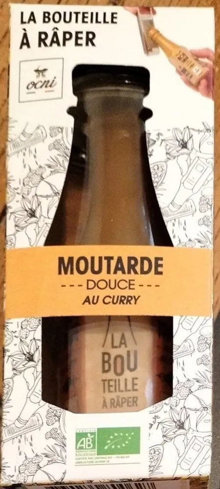 Moutarde douce au curry. La bouteille à raper