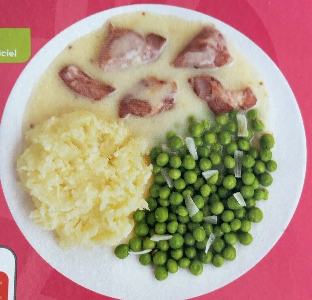 Porc sauce au poivre evrase de pommes de terre et petits pois