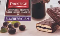 Sandwich Biscuits With Cocoa Glazing And Blueberry Jam