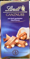 Lindt Ganznuss 4000539002809 Vollmilch-Schokolade mit ganzen Haselnüssen. Kakao: 30% mindestens in der Milch-Schokolade.