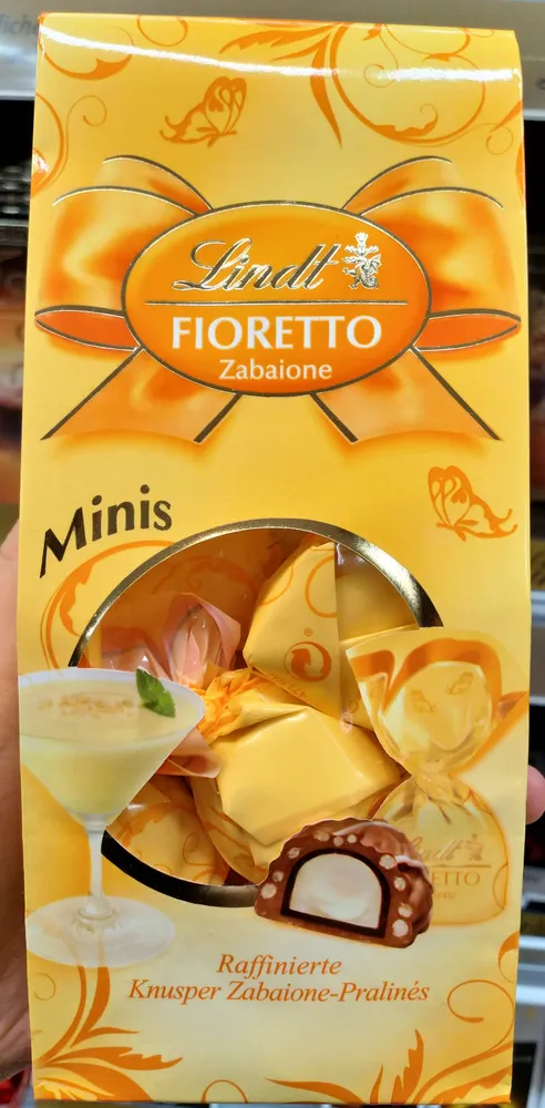 Lindt Fioretto Zabaione Minis 4000539104947 Raffiniertes Praliné mit Zabaione-Trüffel-Füllung (32%) und Getreide Crisp (6%