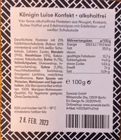 Geschichtete Pasteten mit 21% Edelbitterschokolade (Kakao: 60% mindestens) und 14% weißer Schokolade.