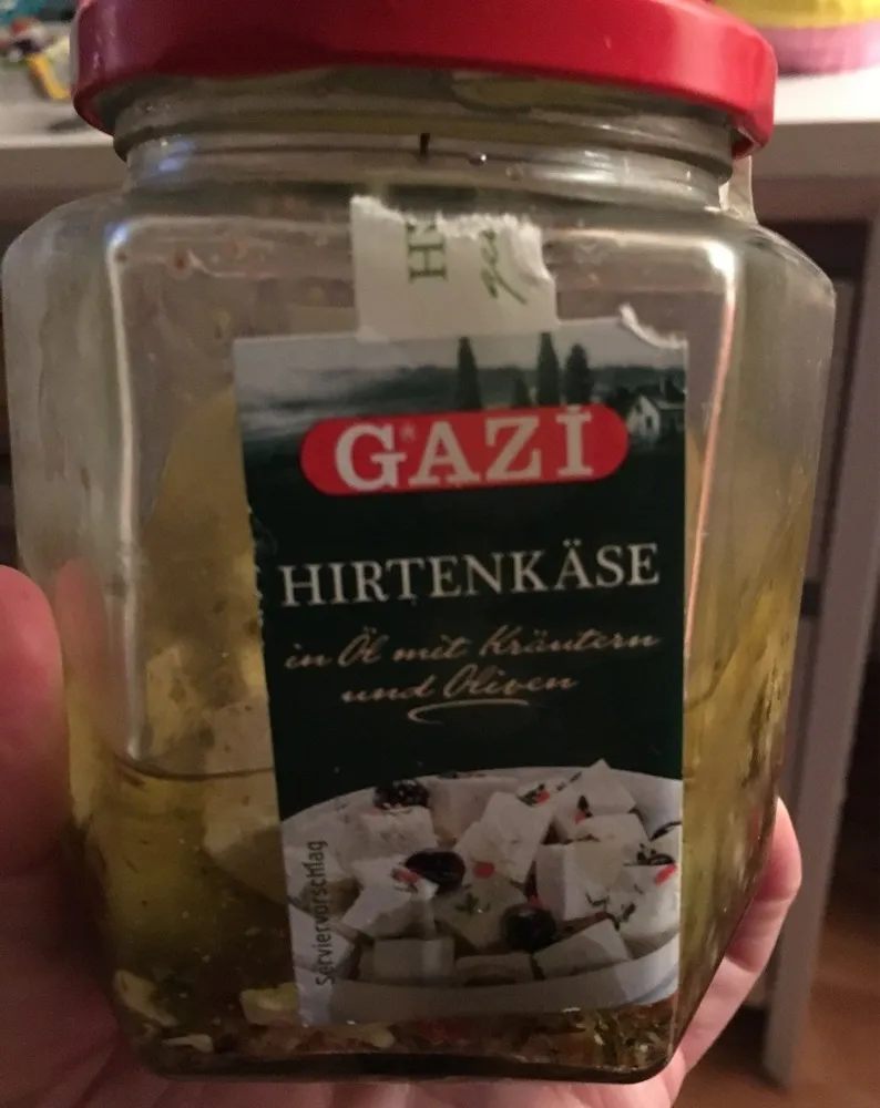 Hirtenkäse, In öl Mit Kräutern Und Oliven