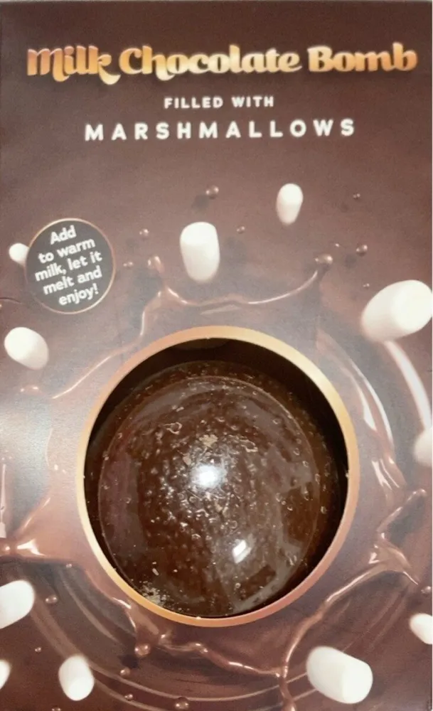Milk chocolate bomb filled with marshmallows