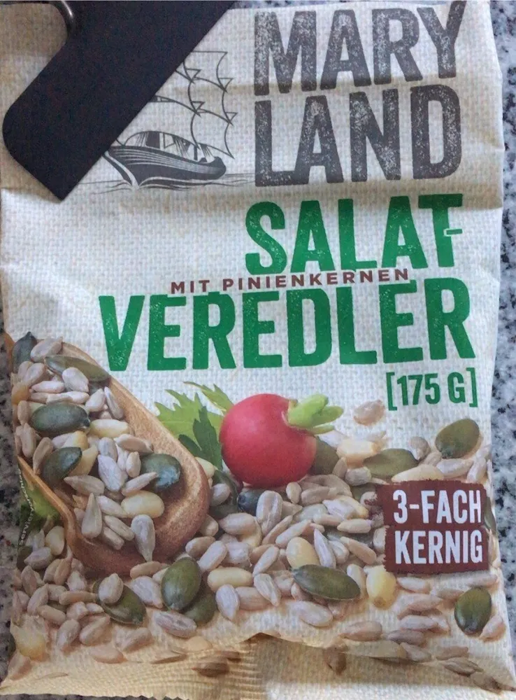 Salatveredler mit Pinienkernen