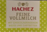 Edelvollmilchschokolade mit weißer und Zartbitterschokolade garniert