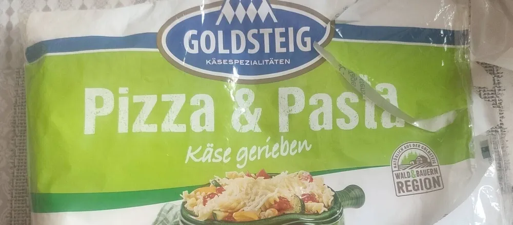 Pizza & pasta käse gerieben