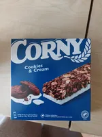 Müsli bar with cocoa cookie pieces and cream glaze