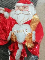Weihnachtsmann aus Edel-Vollmilchschokolade "merci"