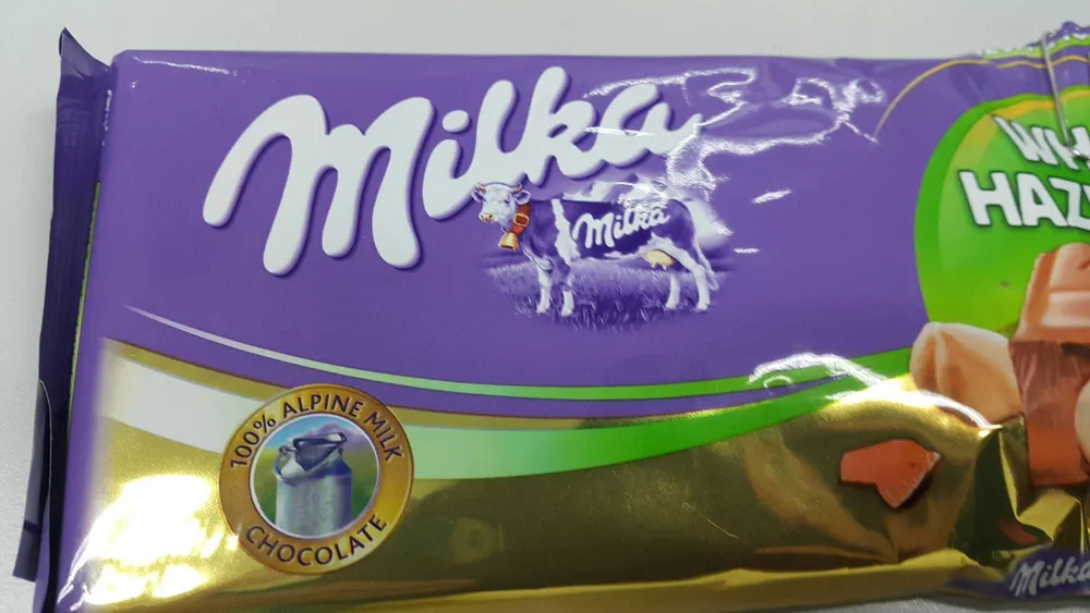 Milka chocolate tablet milk with whole nuts