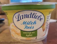 Milch Reis unterlegt mit Apfel