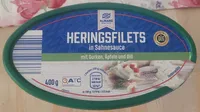 Heringsfilet in Sahnesauce mit Gurken, Äpfeln und Dill