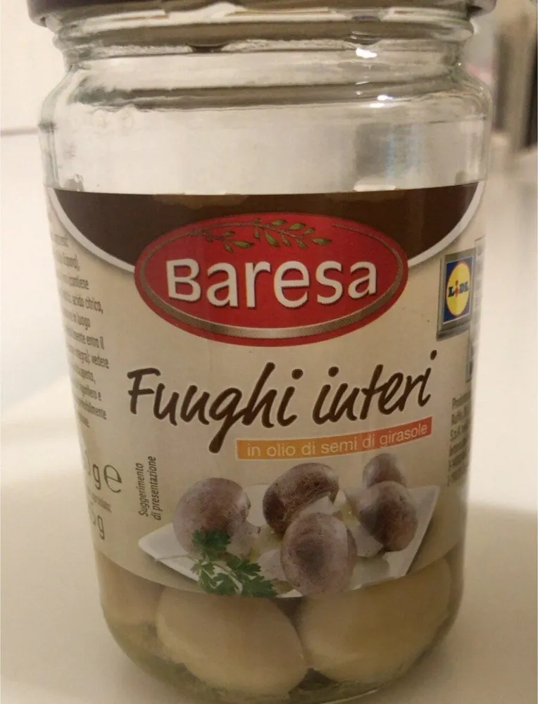 Funghi interi in olio di semi di girasole