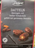 Datteln herber Schokolade gefüllt mit Mandeln