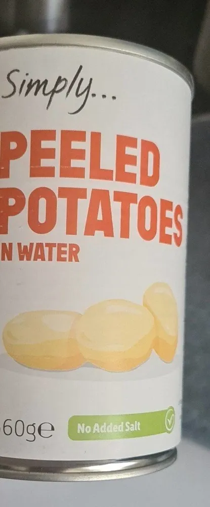 Peeled potatoes in water