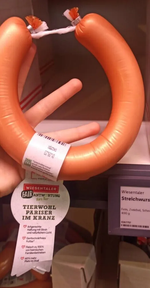 TIERWOHL PARISER IM KRANZ