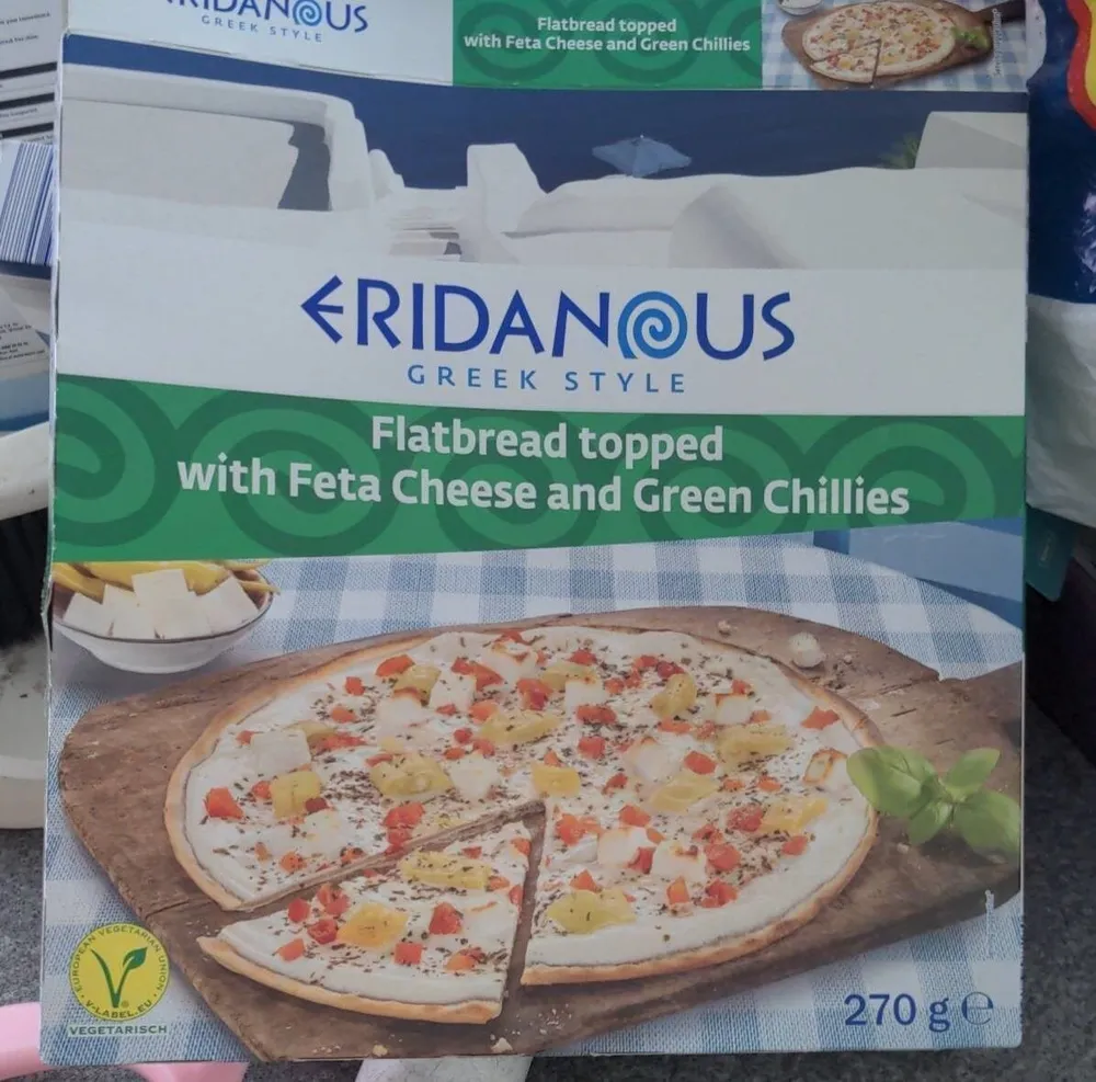 Flatbread topped with feta cheese and green chillies