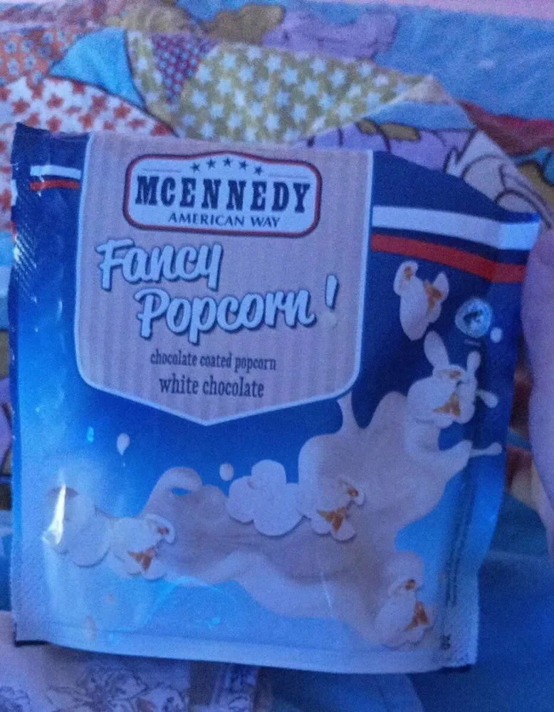 pop corn ricoperti di cioccolato bianco