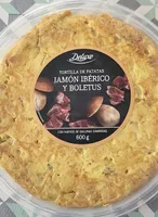 Tortilla de patatas, jamón ibérico y boletus