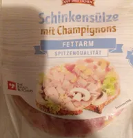 Schinkensülze mit Champignons in Aspik