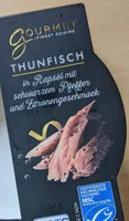 Thunfisch in Rapsöl mit schwarzem Pfeffer und Zitrone