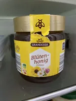 Blütenhonig flüssig im Glas