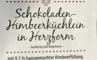 Schikoladen Himbeerkuchkein un Herzfirn