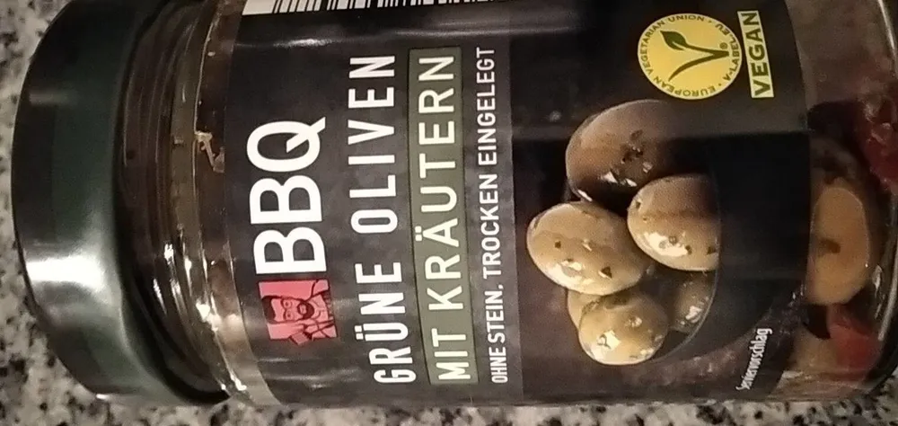 Grüne Oliven mit Kräutern