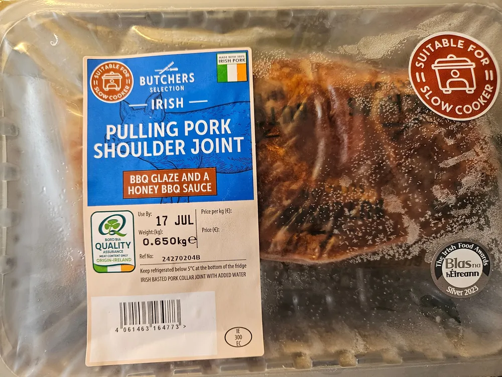 pulling shoulder joint with bbq sauce