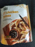 Steamed Asian Style Wheat  Dumplings filled with Chicken and Vegetables in an Oriental Style Sauce