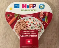 Gemüsereis mit Erbsen und zartem Geschnetzelten