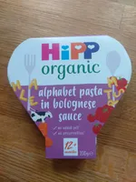 Flying alphabet pasta in a bolognese sauce