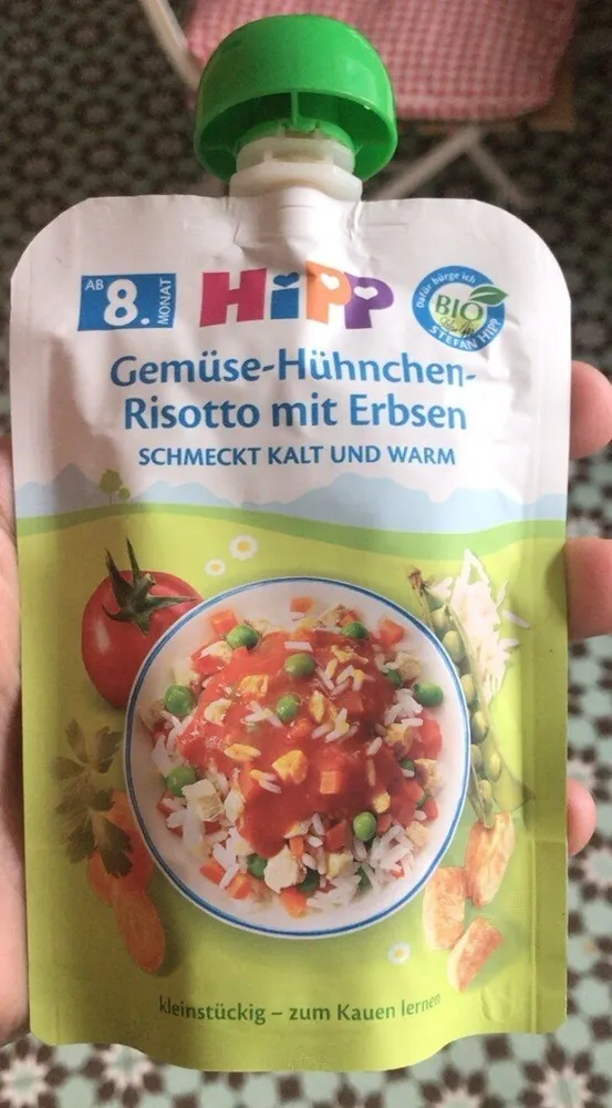 Bio Gemüse Hühnchen Risotto mit Erbsen
