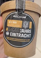 125 JAHRE EINTRACHT VANILLEEIS MIT HIMBEERSOBE (10 %) UND DUNKLEN SCHOKOLADENRASPELN (4 %)