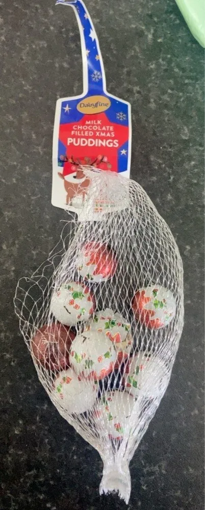 Milk chocolate filled xmas puddings