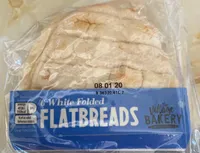 Six white folded flatbreads