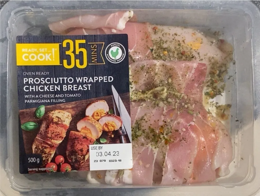 Prosciutto Wrapped Chicken Breast with a Cheese and Tomato Parmigiana Filling