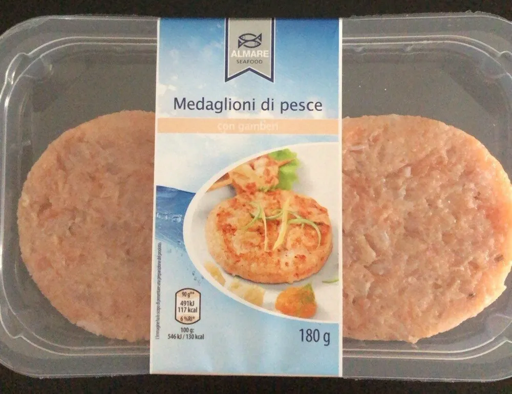 Medaglioni di pesce con gamberi