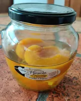 Katarina Pfirsiche mit Zitronenscheibe und Zitronensaft