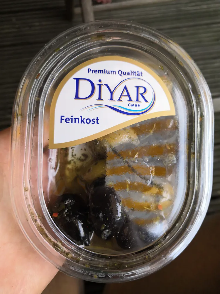 Oliven Schwarz Grün Kräuter