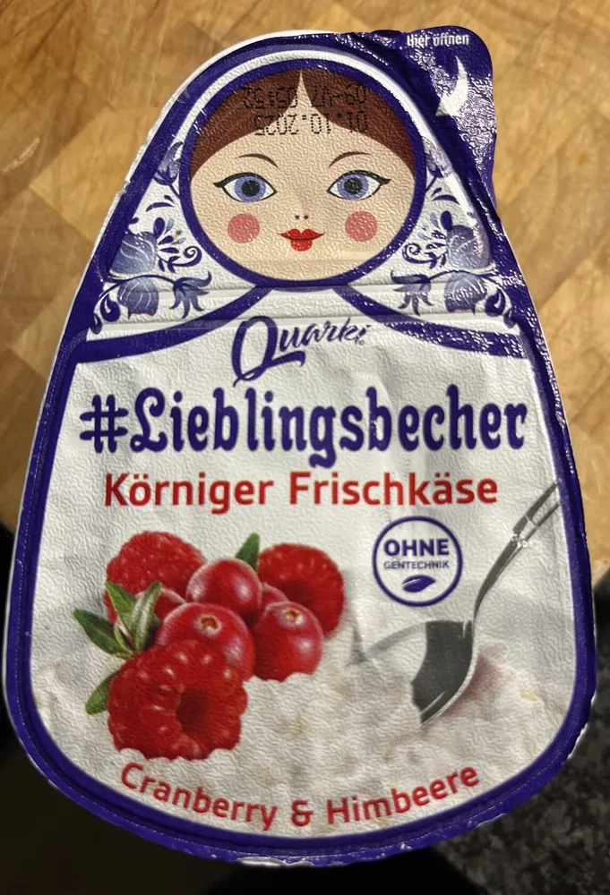 Körniger Frischkäse mit Cranberry- und Himbeerzubereitung