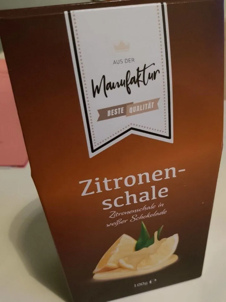 Zitronenschale in weißer Schokolade