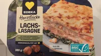Lachslasagne mit Blattspinat 380 g 4311501086605 Nudelplatten geschichtet mit 22% Lachs und 12% Blattspinat in Sauce, mit 2,9% Emmentaler bestreut, tiefgefroren.