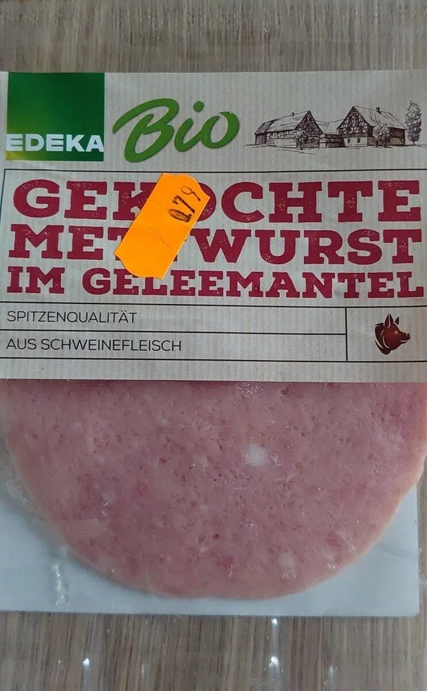 Gekochte Mettwurst im Geleemantel