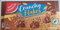 Crunchy Flakes Pralinen aus 74% Vollmilchschokolade mit 20% Cornflakes und 6% gehackten Mandeln