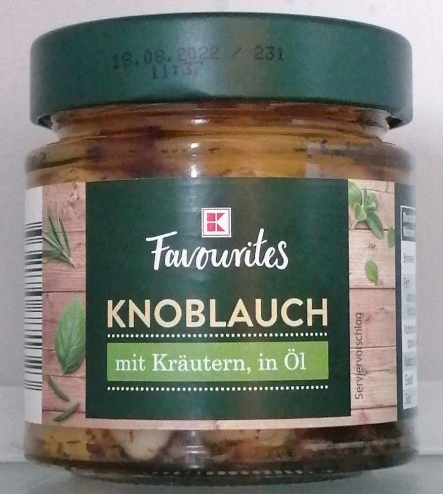 Knoblauch mit Kräutern in Öl