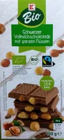 Schweizer Vollmilchschokolade mit ganzen Nüssen